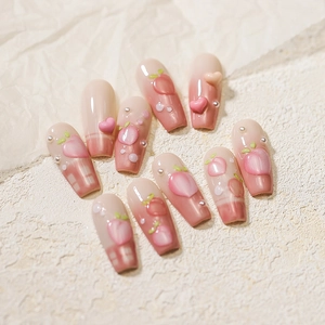 Faux ongles faits main pêche rose avec motifs de fruits 3D et perles décoratives