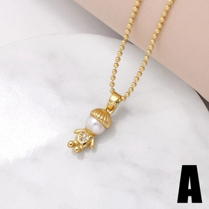 Gold beaded chain necklace featuring a cute pearl boy pendant with sparkling zircons