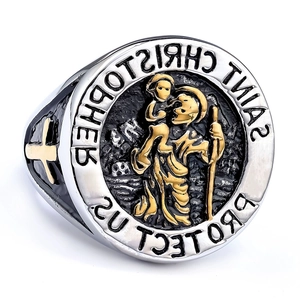 Detailed macro view of two-tone Saint Christopher protect us religious signet ring