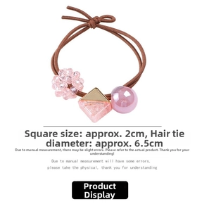 Detail of elastic hair tie with 2cm pink resin charms and crystal beads for girls