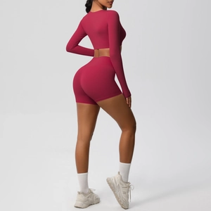Detail view of burgundy brushed long sleeve yoga crop top and high waist shorts set