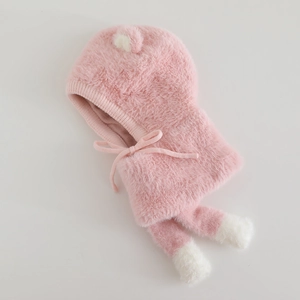 Detailed view of the soft pink plush texture and cute white bear ears on the winter hood
