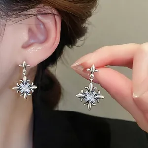 Vintage silver fleur-de-lis earrings with zircon stones in a retro gothic aesthetic style