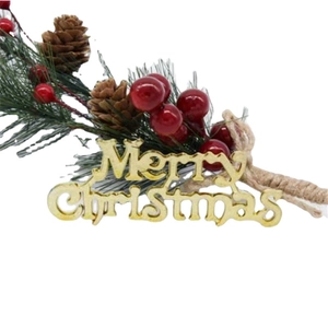 Merry Christmas plaque with pine needles, cones and red berries for holiday decor