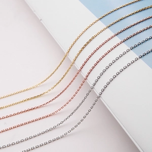 Close-up of S925 sterling silver, gold, and rose gold cable chain necklaces