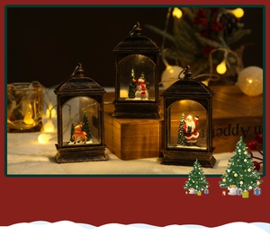 Close-up of vintage lighted Christmas lanterns with Santa, Snowman and Reindeer scenes