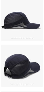 Detail of navy quick-dry baseball cap with mesh panels and white letter embroidery