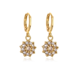 Detail of 18K gold plated copper flower earrings with sparkling zircon stones