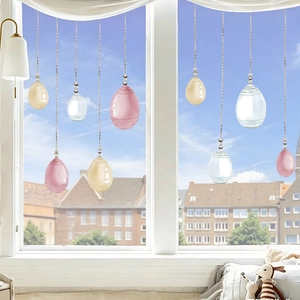 Hanging Easter egg window decals in pink and blue for festive home wall decoration