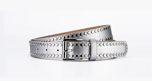 Macro view of silver PU leather belt with round metal studs and square pin buckle detail