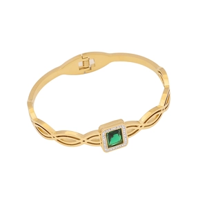 Gold hollow bangle featuring emerald-cut green gemstone with zircon halo on white background