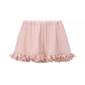 Detail view of pink chiffon mini skirt featuring elastic waist and ruffled hemline