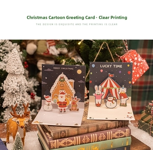 3D pop-up Christmas cards featuring Santa Claus, gingerbread house and circus tent themes