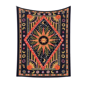 Bohemian sun and moon tapestry wall hanging with celestial tarot design on black fabric