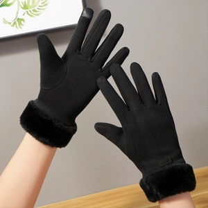 Detail of black thermal suede gloves for women featuring touch screen fingertips and faux fur cuff