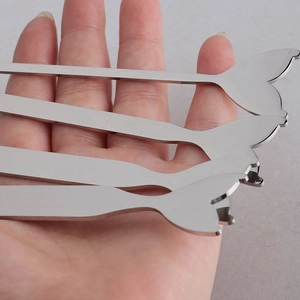 Polished stainless steel dessert spoons with creative mermaid tail handle design