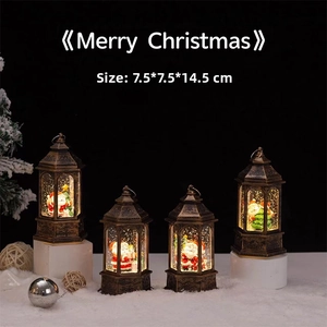 Close-up of four bronze Christmas lanterns with Santa and snowman scenes, 7.5x14.5cm size