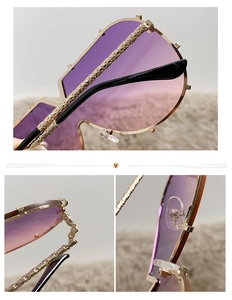 Macro details of golden metal frame with intricate engraving and purple gradient lenses