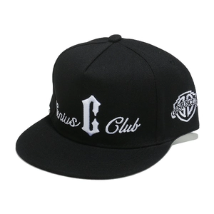Detail shot of the 3D 'Genius Club' embroidery on the black flat brim hip hop hat