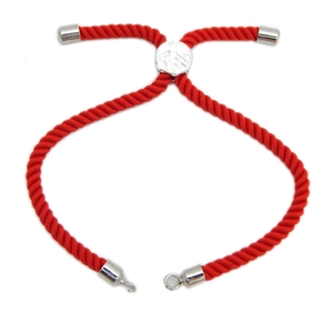 Adjustable red braided rope bracelet with polished silver sliding clasp on white background
