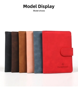 Detail view of multi-color passport covers with airplane embossing and secure buckle closure