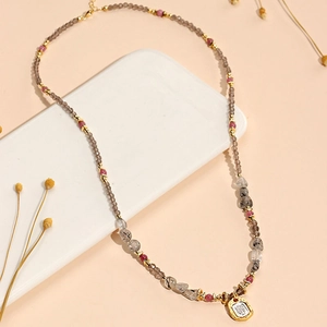 Handmade beaded necklace with peridot tourmaline and gold rectangular stone pendant