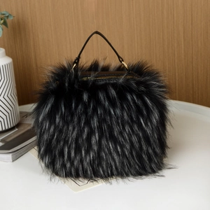 Close-up of faux raccoon fur handbag with leather handles and golden hardware details