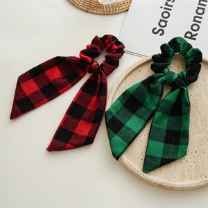 Christmas plaid hair scrunchies with bow in red and green festive checkered pattern