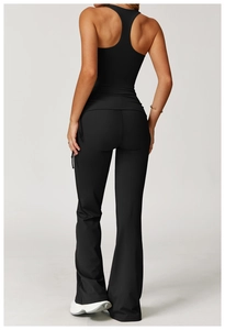 Back view of black yoga set featuring racerback tank top and flared high-waist pants
