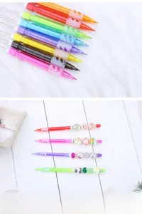 Detail of DIY beadable mechanical pencil with frosted colorful barrels and cute beads