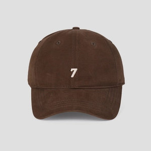 Detailed front view of brown cotton baseball cap with white number 7 embroidery