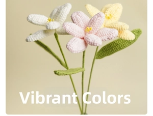 Macro detail of handmade crochet tulip bouquet in pink, white and yellow yarn