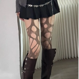 Brown ripped hollow-out fishnet tights with irregular distressed holes for street style