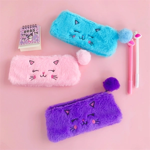 Detailed plush texture of cat pencil cases in pink, blue and purple with zipper pom-poms