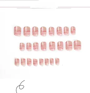 Detail view of 24pcs pink and white wave pattern short press-on nails set with base