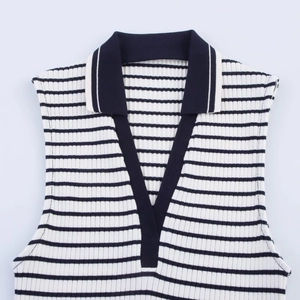 Detailed close-up of the ribbed texture and polo collar on the striped knit vest