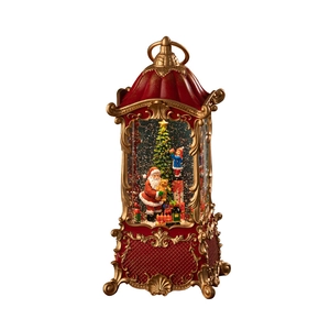 Christmas lantern with Santa Claus and sparkling snow in a vintage red pavilion design