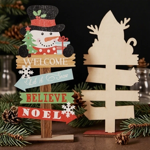 Wooden Christmas welcome signs featuring painted snowmen and blank DIY wood bases