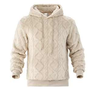 Close-up of beige heavy fleece hoodie showing diamond embossed texture and size M label