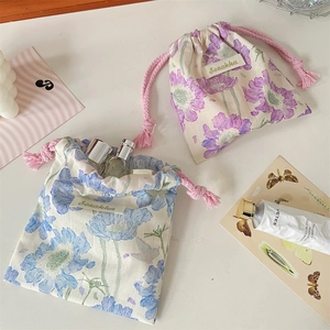 Sacchetti con coulisse a fiori in cotone e lino blu e viola per cosmetici