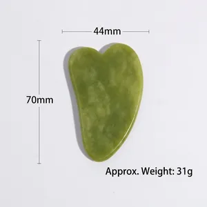 Detail showing dimensions of green jade gua sha tool with 70mm height and 44mm width