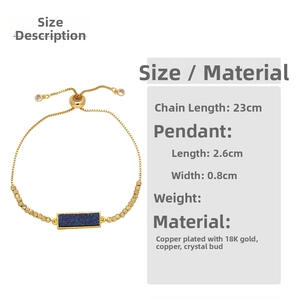 Detail of 18k gold plated box chain bracelet with blue rectangular druzy stone and size labels