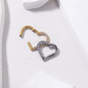 G23 titanium heart-shaped hinge hoop earrings with cubic zirconia in gold and silver