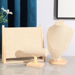 Linen jewelry display set with wooden base including necklace bust and bracelet T-bar stand