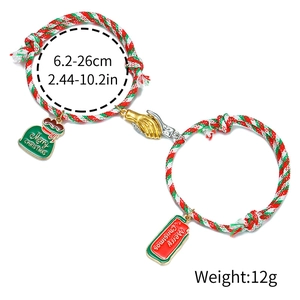 Magnetische Weihnachtsarmbänder für Paare aus rot-grünem Seil mit weihnachtlichen Anhängern