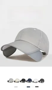 Detail of retractable wide brim and laser-cut ventilation holes on outdoor sun hat