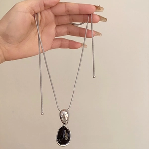 French vintage silver snake chain long necklace with an oval black resin pendant
