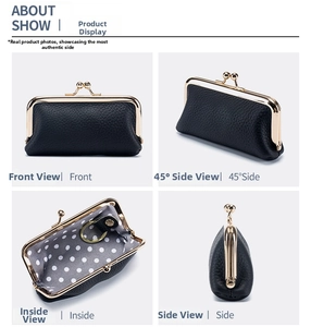 Detail of black lychee grain leather coin purse with kiss-lock and polka dot lining