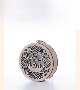 Laser-cut wooden Eid Mubarak pendant featuring a mosque silhouette and mandala patterns