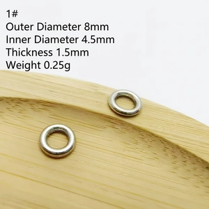 Detail of 8mm silver finish metal ring spacer showing inner and outer diameter specs